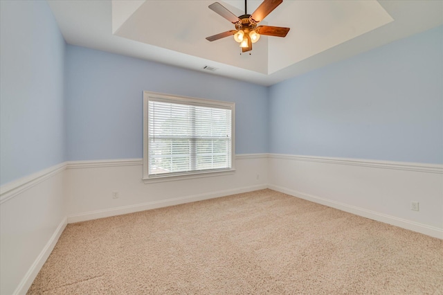 5197 Windmill Pl, Evans, GA 30809 - carpeted spare room featuring a ceiling fan and a tray ceiling