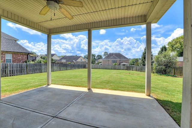 5197 Windmill Pl, Evans, GA 30809 - fenced backyard featuring a ceiling fan, a patio area, and a residential view