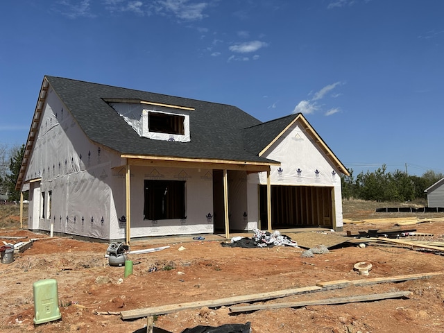 property under construction with an attached garage