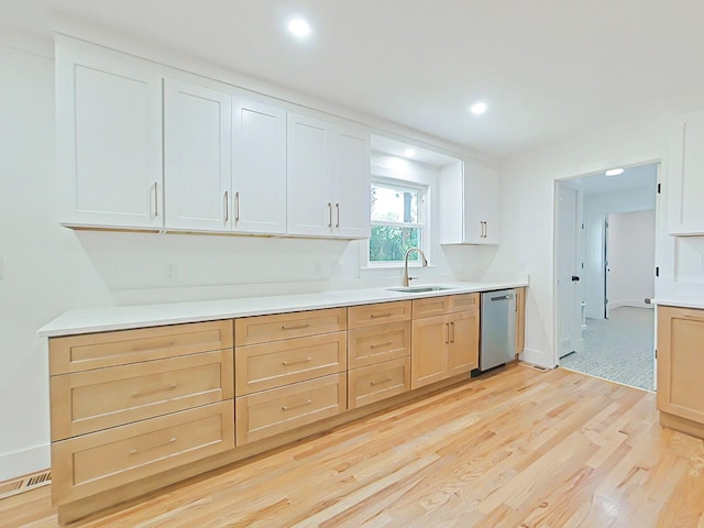 623 Stanton Dr, North Augusta, SC 29841 - kitchen featuring stainless steel dishwasher, light brown cabinetry, light wood-type flooring, light countertops, and recessed lighting