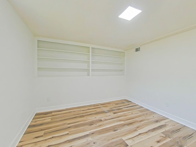 623 Stanton Dr, North Augusta, SC 29841 - empty room with light wood-type flooring and built in features