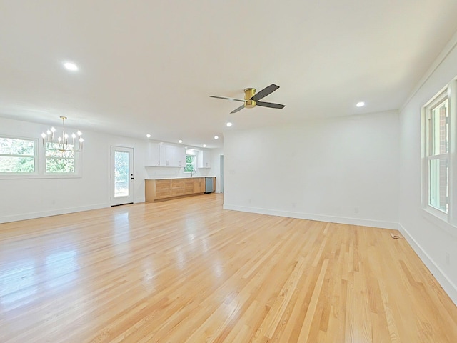 623 Stanton Dr, North Augusta, SC 29841 - unfurnished living room with a chandelier, light wood-style floors, recessed lighting, and a ceiling fan