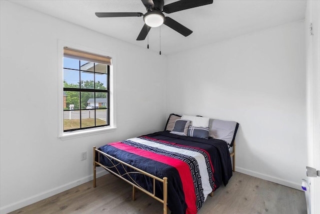 2726 Cardigan Ct, Hephzibah, GA 30815 - bedroom featuring wood finished floors, baseboards, and a ceiling fan
