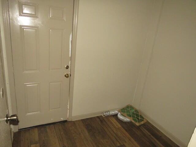 interior space featuring dark wood-type flooring