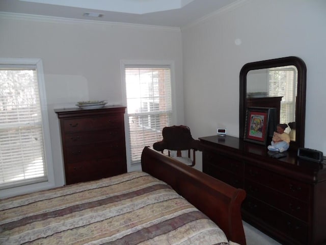 bedroom featuring crown molding