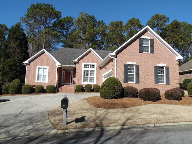 view of front of house with brick siding