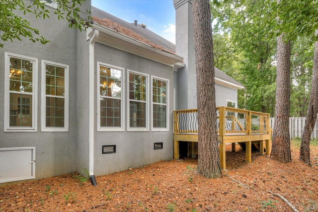 view of home's exterior with a deck