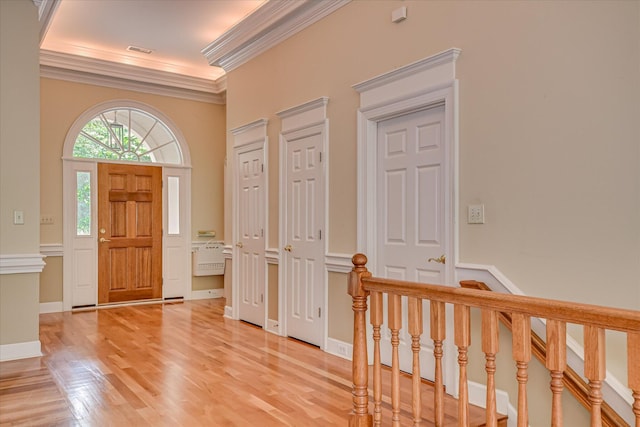 12 Shadowbrook Cir, Augusta, GA 30909 - entryway featuring light wood-type flooring, crown molding, and stairs