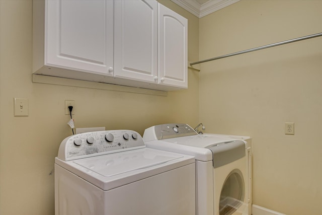 12 Shadowbrook Cir, Augusta, GA 30909 - clothes washing area featuring cabinet space, washer and dryer, ornamental molding, and baseboards