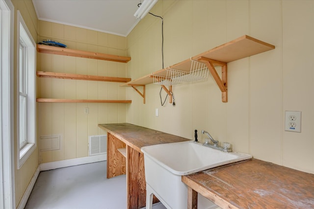 12 Shadowbrook Cir, Augusta, GA 30909 - laundry room featuring crown molding and a sink