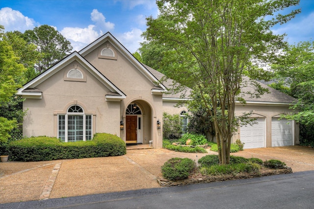 12 Shadowbrook Cir, Augusta, GA 30909 - view of front of property featuring stucco siding, concrete driveway, and an attached garage