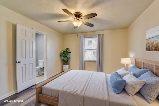 bedroom featuring wood finished floors, a ceiling fan, and baseboards