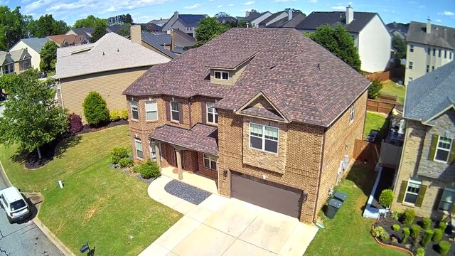 343 Abby Cir, Greenville, SC 29607 - view of front of property featuring a residential view, brick siding, an attached garage, and concrete driveway
