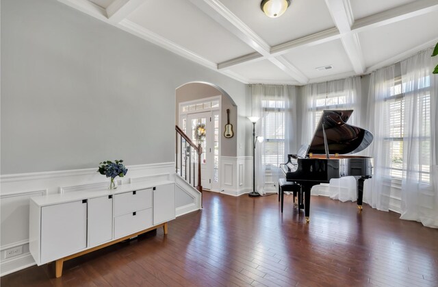 343 Abby Cir, Greenville, SC 29607 - foyer entrance featuring coffered ceiling, arched walkways, beamed ceiling, a decorative wall, and a wainscoted wall