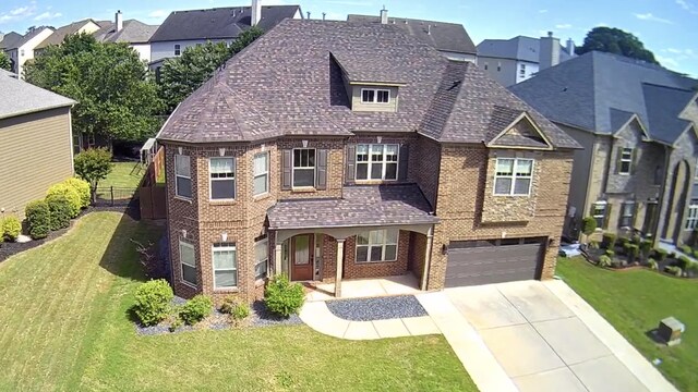 343 Abby Cir, Greenville, SC 29607 - view of front of house featuring brick siding, a garage, concrete driveway, and a residential view
