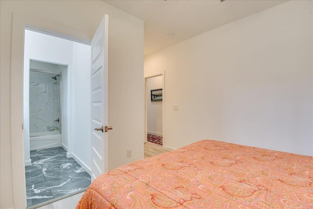 bedroom with marble look tiles