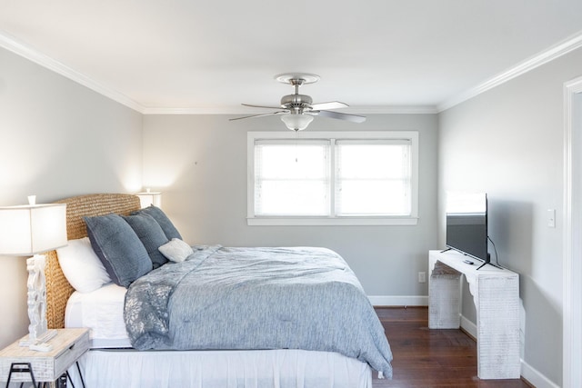 bedroom featuring dark wood-type flooring, ornamental molding, and ceiling fan