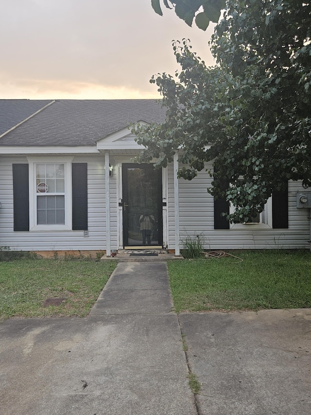 407 Woodhazel Way, Hephzibah, GA 30815 - view of front of home featuring roof with shingles and a lawn