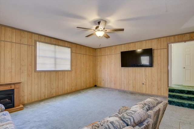 living room with light colored carpet and ceiling fan