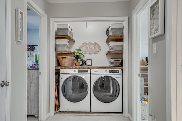 laundry area with laundry area and independent washer and dryer