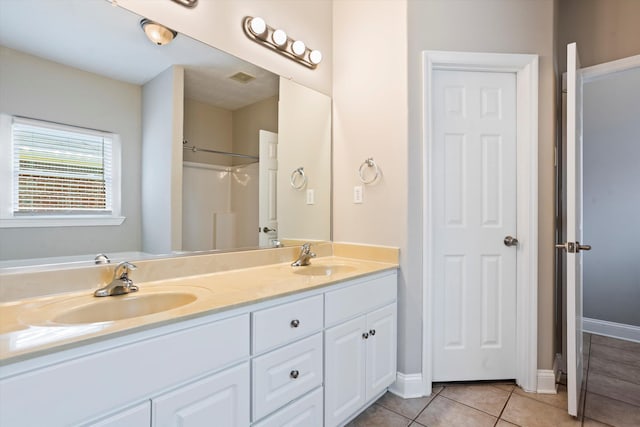 2042 Silver Run Fls, Grovetown, GA 30813 - bathroom with double vanity, tile patterned floors, and a shower