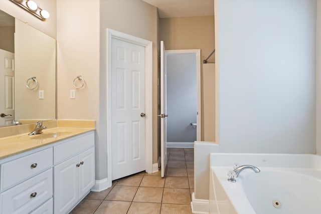 2042 Silver Run Fls, Grovetown, GA 30813 - full bathroom featuring vanity, tile patterned flooring, and a whirlpool tub