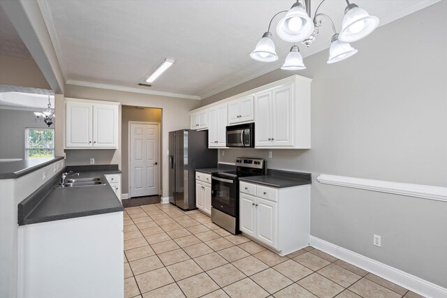 2042 Silver Run Fls, Grovetown, GA 30813 - kitchen featuring appliances with stainless steel finishes, a chandelier, dark countertops, light tile patterned flooring, and crown molding
