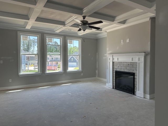 unfurnished living room featuring a ceiling fan, crown molding, a brick fireplace, baseboards, and coffered ceiling