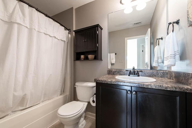 full bathroom featuring toilet, vanity, and shower / bathtub combination with curtain