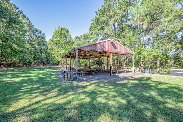 view of home's community with a yard