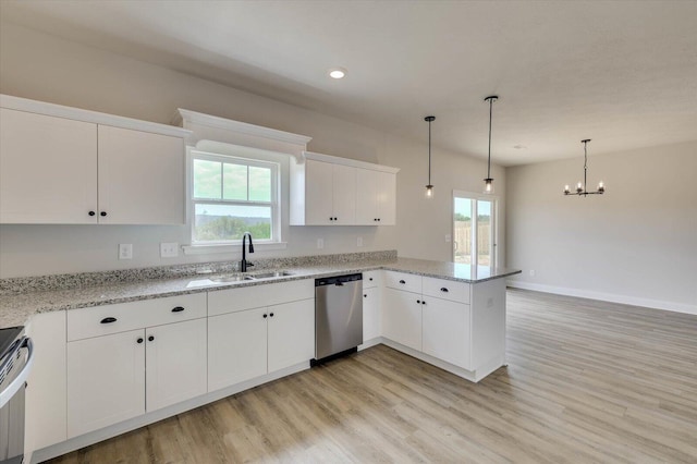 kitchen with dishwasher, kitchen peninsula, white cabinetry, and sink