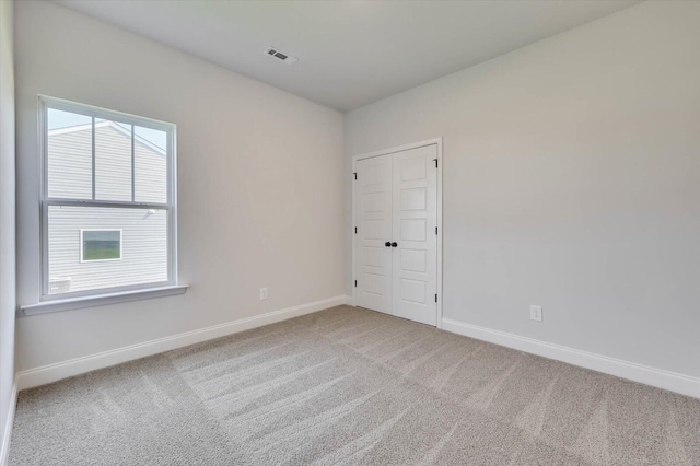 empty room with carpet floors