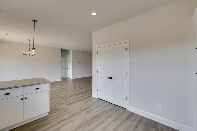 interior space with light hardwood / wood-style floors