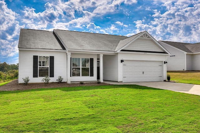 ranch-style home with a garage and a front lawn