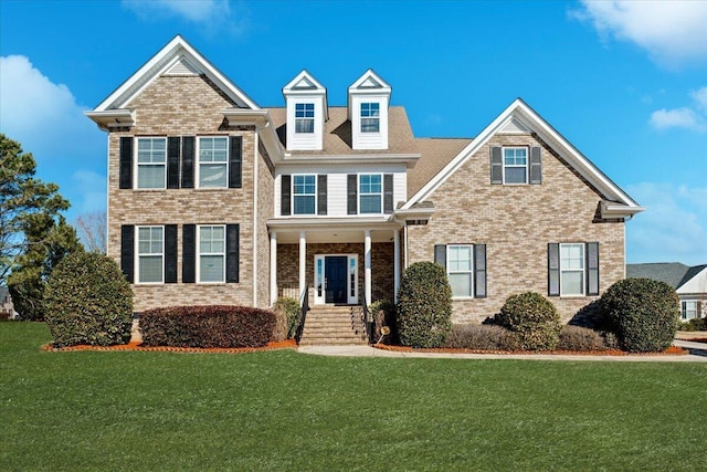 view of front facade with a front yard