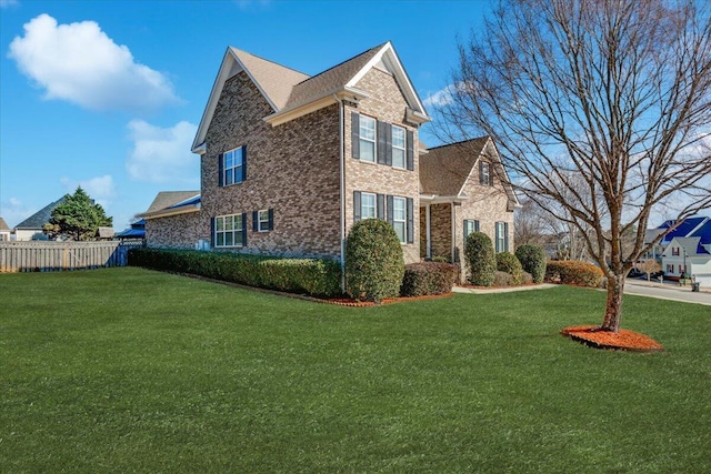 view of home's exterior featuring a lawn