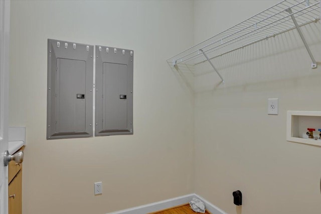 clothes washing area with hookup for a washing machine and electric panel