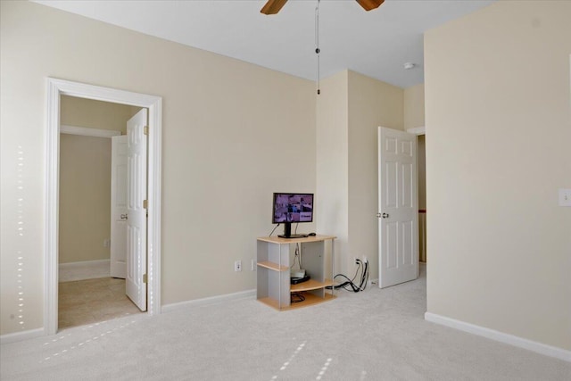 interior space featuring ceiling fan