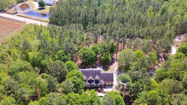 drone / aerial view with a forest view