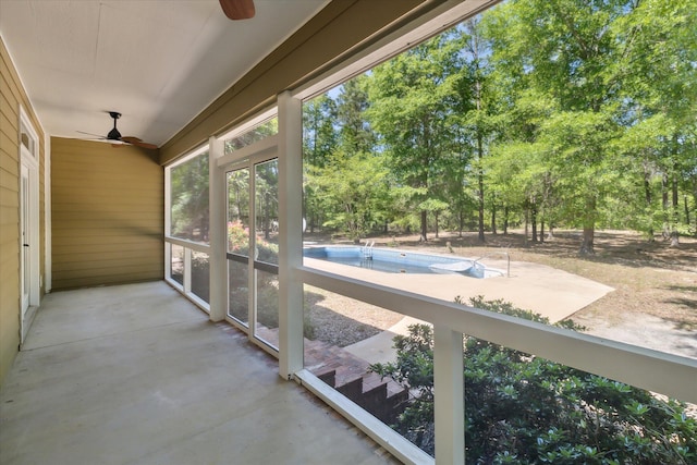 balcony with ceiling fan and a patio area