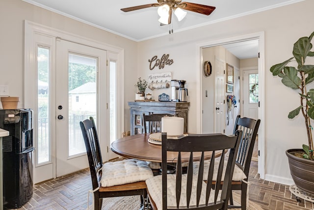 217 Longmeadow Rd, North Augusta, SC 29860 - dining area featuring a ceiling fan, plenty of natural light, ornamental molding, and brick floors