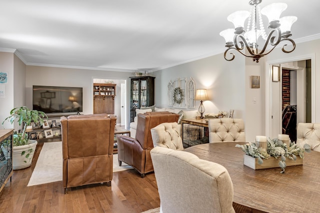 217 Longmeadow Rd, North Augusta, SC 29860 - dining room with ornamental molding, wood finished floors, and a chandelier
