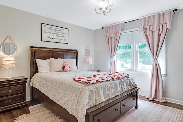 217 Longmeadow Rd, North Augusta, SC 29860 - bedroom featuring wood finished floors and a chandelier