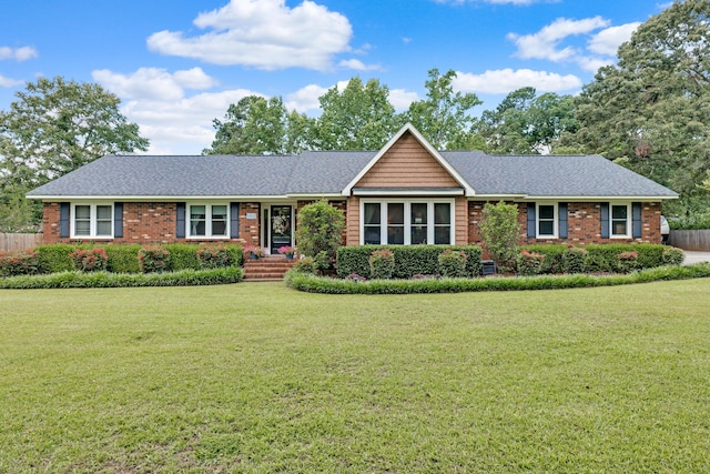 217 Longmeadow Rd, North Augusta, SC 29860 - ranch-style home with a front yard and roof with shingles