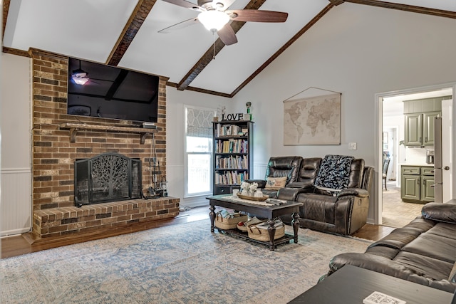 217 Longmeadow Rd, North Augusta, SC 29860 - living area featuring a ceiling fan, wood finished floors, high vaulted ceiling, a fireplace, and beam ceiling