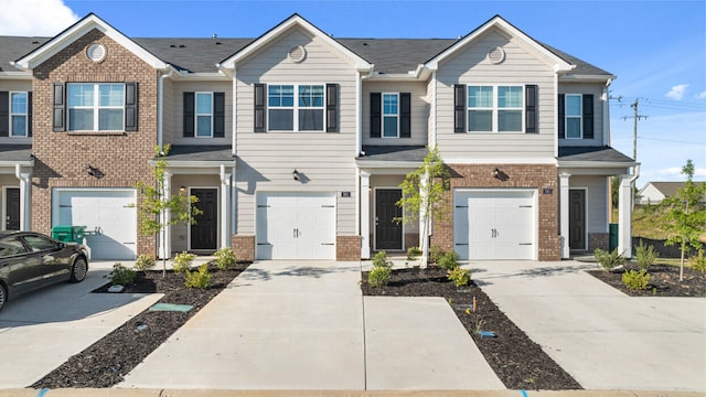 3457 Firestone Dr, Hephzibah, GA 30815 - multi unit property with brick siding, a garage, and driveway