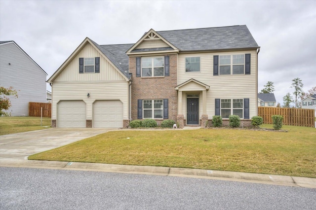 view of front of home featuring a garage and a front lawn