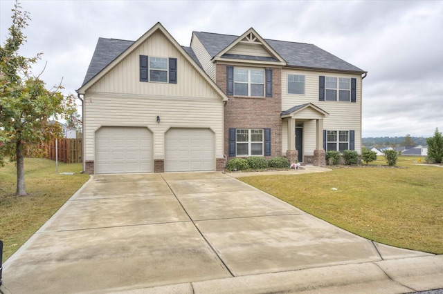 view of front facade featuring a front yard and a garage