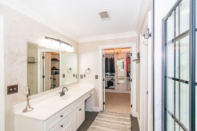 701 Fosters Ct, Evans, GA 30809 - bathroom with a spacious closet, vanity, and ornamental molding