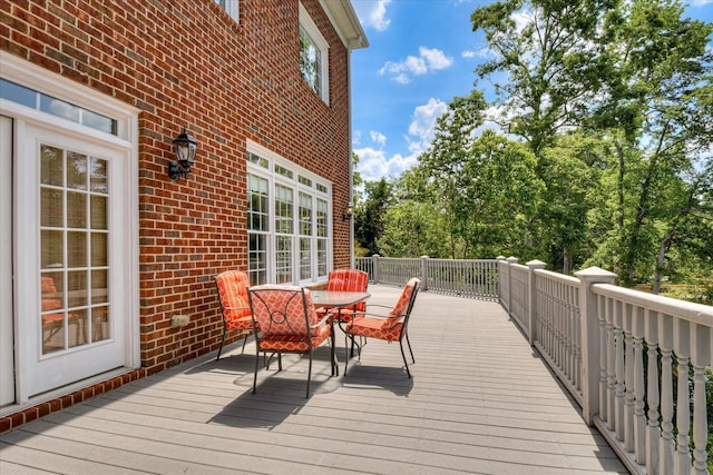 deck with outdoor dining space
